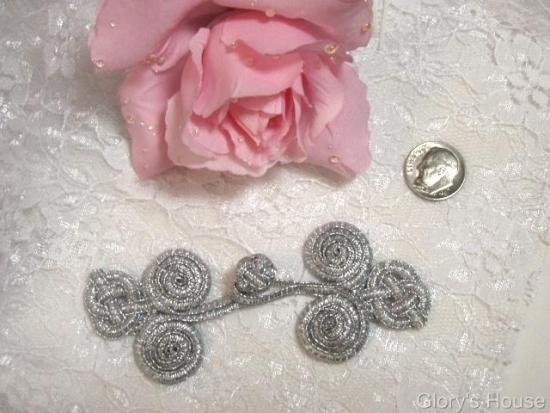0251  Silver Triple Swirl Frog Button Closure 4"
